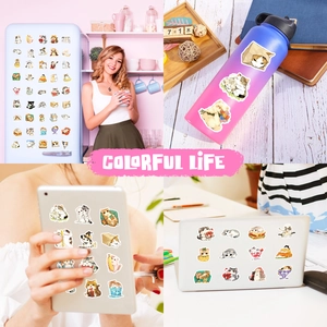 Waterproof cute cat stickers displayed on fridge, kettle, tablet and laptop surfaces