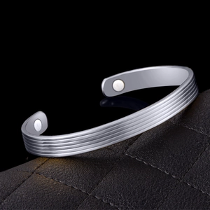 Silver magnetic therapy cuff bracelet with parallel grooved lines for women