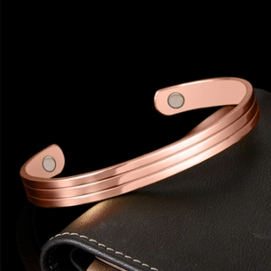Polished 18K rose gold plated magnetic therapy open cuff bracelet with triple groove lines