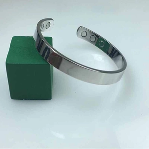 Polished silver magnetic therapy open bangle with high-gloss mirror finish for women
