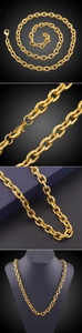 Detail of 18K gold plated O-chain necklace showing lobster clasp and chunky links