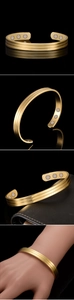 Detail of 18K gold plated therapy cuff with six built-in magnets for wellness