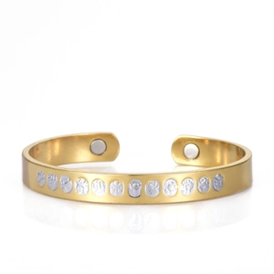 Polished 18K gold-plated open bangle with magnetic accents and silver circle reliefs