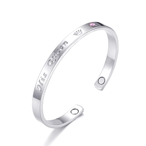 Silver magnetic health bracelet with His Queen engraving and pink rhinestone detail
