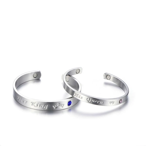 Detail of Her King and His Queen steel bangles with magnetic clasp and crown engraving