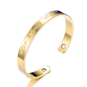 Gold Her King magnetic therapy bracelet with blue gemstone and crown engraving