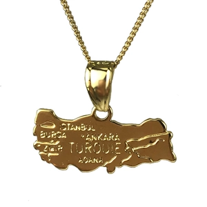 Detail of 18K gold-plated Turkey map pendant with engraved cities and wheat chain