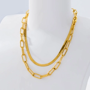 Double-layered 18K gold-plated flat snake and paperclip link chain necklace on model