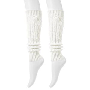 Detailed close-up of white cable knit leg warmers with decorative plush pom-poms