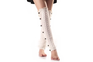Detail of cable knit leg warmers with vintage black buttons and delicate lace trim