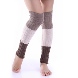 Close-up of three-color patchwork ribbed knit leg warmers with warm wool texture