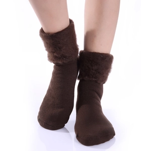 Close-up of winter thermal socks featuring thick plush cuffs and warm knitted texture