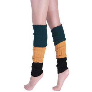 Detail of ribbed knit leg warmer with green, yellow, and black color block pattern