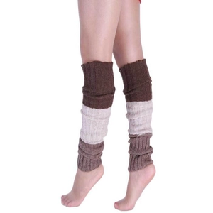 Detail of three-color knit leg warmers with ribbed cuffs in brown and beige tones