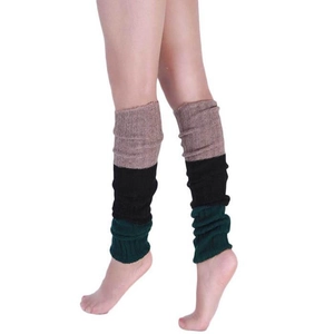Detailed knit texture of three-color patchwork leg warmers in ribbed cashmere style