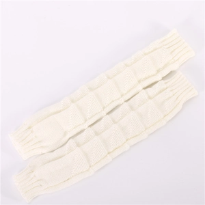 Detailed view of cream knit arm warmers with a textured check pattern and ribbed cuffs