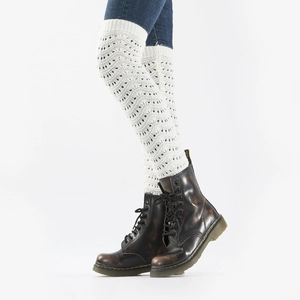 White crochet knit leg warmers with vintage hollow wave patterns on model in boots