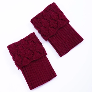Scalloped knit leg warmers in burgundy red with hollow leaf pattern and ribbed texture