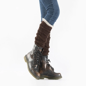 Detail of dark brown cable knit leg warmers with delicate off-white lace trim detail