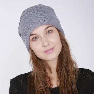Grey ribbed knit beanie cap for men and women featuring warm autumn winter elastic fabric
