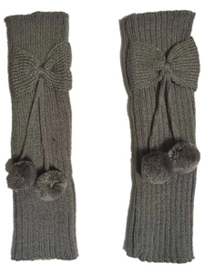 Detail of grey knitted leg warmers with bow and plush ball pompons for children