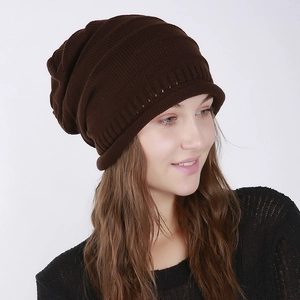 Close-up of the ribbed knit texture and slouchy drape on this dark brown beanie hat