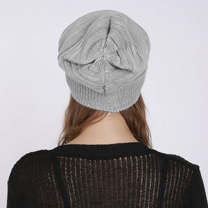Detailed back view of grey knit beanie showing thick texture and slouchy pleated style