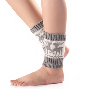 Jambières tricotées avec motif renne et bords côtelés pour bottes d'hiver