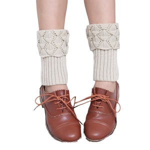 Knitted leg warmers in cream white with hollow diamond patterns for winter boots