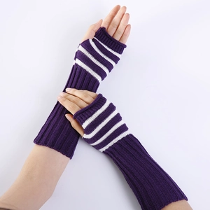 Detail of long purple knitted fingerless gloves with white stripes and ribbed texture