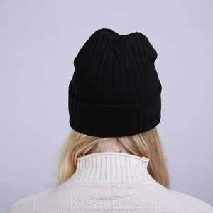 Rear view of a black double-layered ribbed knit beanie hat showing thick texture and cuff