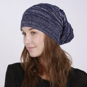 Unisex navy mix knit slouchy beanie for autumn and winter warmth on white background