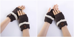 Detail of coffee brown knit fingerless gloves with white lace trim and large button