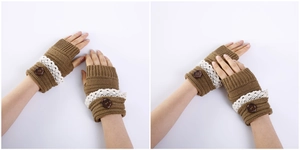 Close-up of knitted fingerless gloves featuring white lace trim and decorative button detail