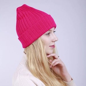 Rose red double-layered ribbed knit beanie hat for winter warmth and outdoor skiing