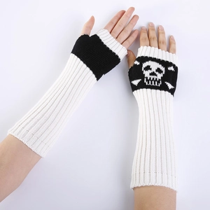 Close-up of long knitted fingerless gloves with white skull and crossbones pattern