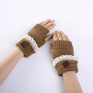 Women's brown knit fingerless gloves with white lace trim and dark decorative buttons