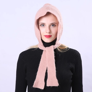 Close-up of a pink knit balaclava hood scarf with soft wool texture for winter warmth