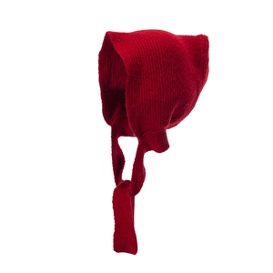 Detailed view of dark red wool knit hood with cat ears and tie-up straps design