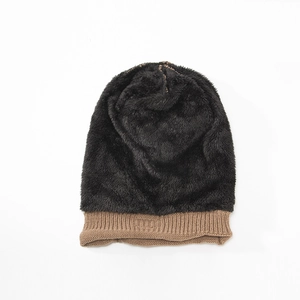 Detailed view of the winter knit hat showing the thick black fleece lining and brown knit exterior