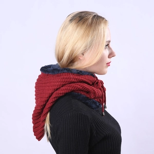 Detail of burgundy knitted hooded scarf with thick fleece lining and adjustable drawstrings