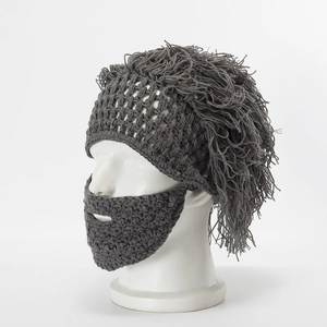 Detail of grey hand-knitted Viking wig hat with thick textured beard on a mannequin