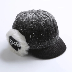 Detailed knit winter hat with black brim, white faux fur earflaps and SMB letter embroidery