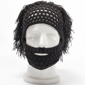 Detailed view of handmade black crochet funny beard hat with integrated shaggy wig texture