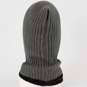 Detail of gray knitted balaclava showing thick rib texture and warm black fleece lining