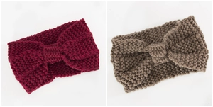 Detail of knitted winter headbands in burgundy and khaki with cross twist pattern