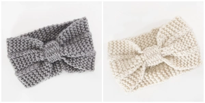 Detail view of thick cable knit winter headbands in grey and beige with bow design