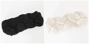 Detail of chunky cable knit headband showing thick yarn texture in black and beige