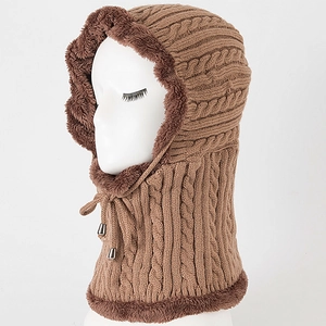 Detailed cable knit pattern on brown winter balaclava with soft faux fur lining and drawstring