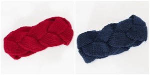 Detail of red and navy braided knit headbands featuring thick cable-knit texture